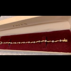 Gold, silver, and diamond bracelet